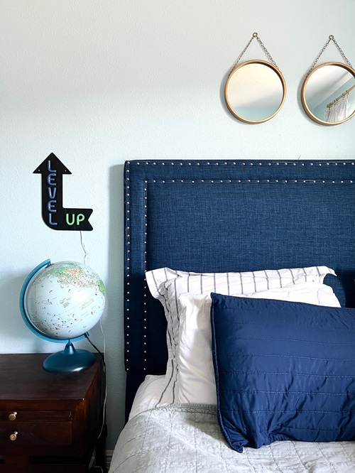 Boys navy bed with level up sign