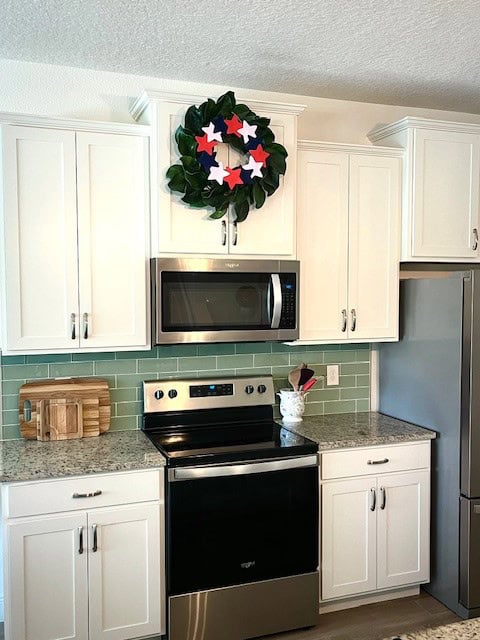 White kitchen with patriotic wreath