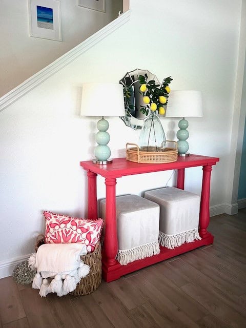 Pink table with two aqua lamps