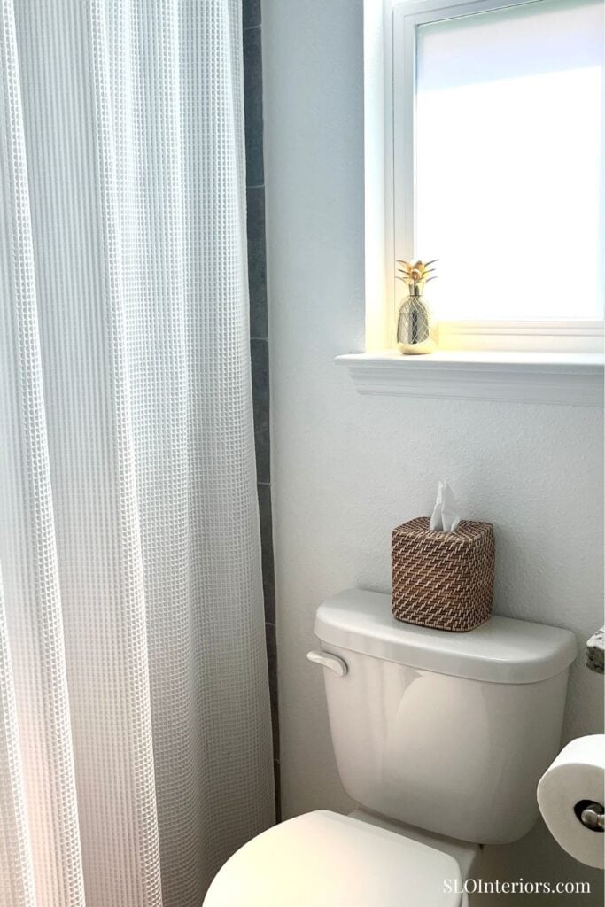 Gold pineapple accessory on window sill