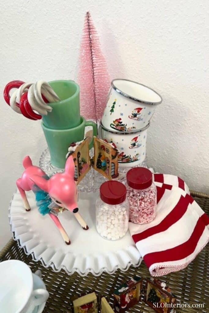 Close up of vintage mugs, Christmas decor and hot cocoa supplies