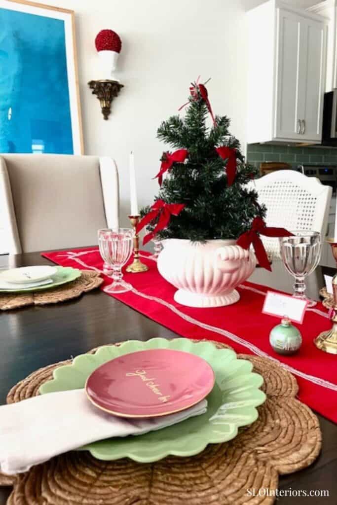 Christmas table setting with small tree with bows
