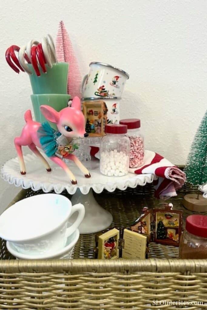 Pink reindeer on white vintage cake stand