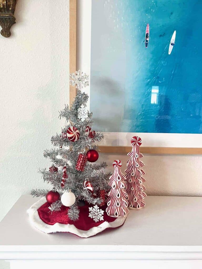 Silver mini Christmas tree with red and white ornaments