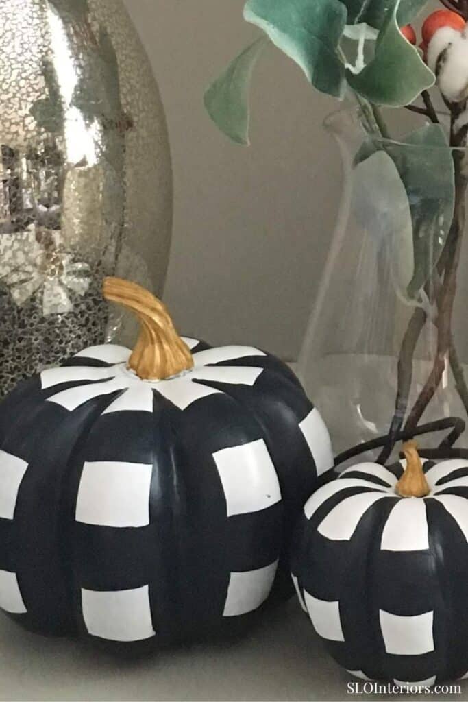 Black and white checkered pumpkin decor for fall or Halloween.