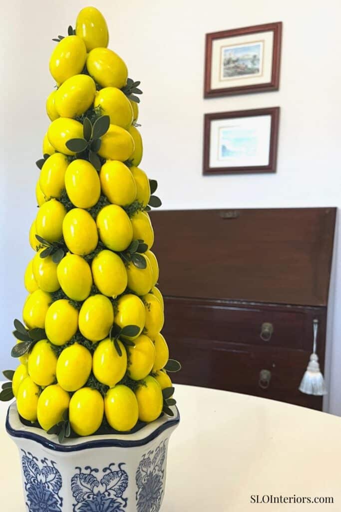 Bright yellow lemon topiary for interior decor.