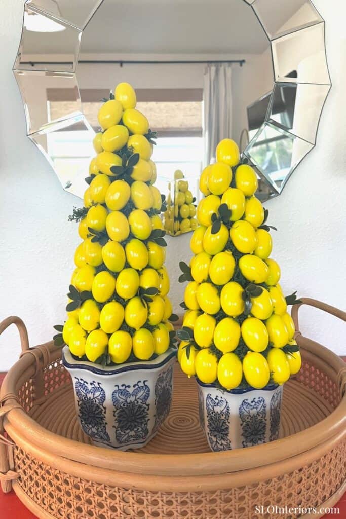 Decorative yellow lemon topiary trees for stylish interior accents.