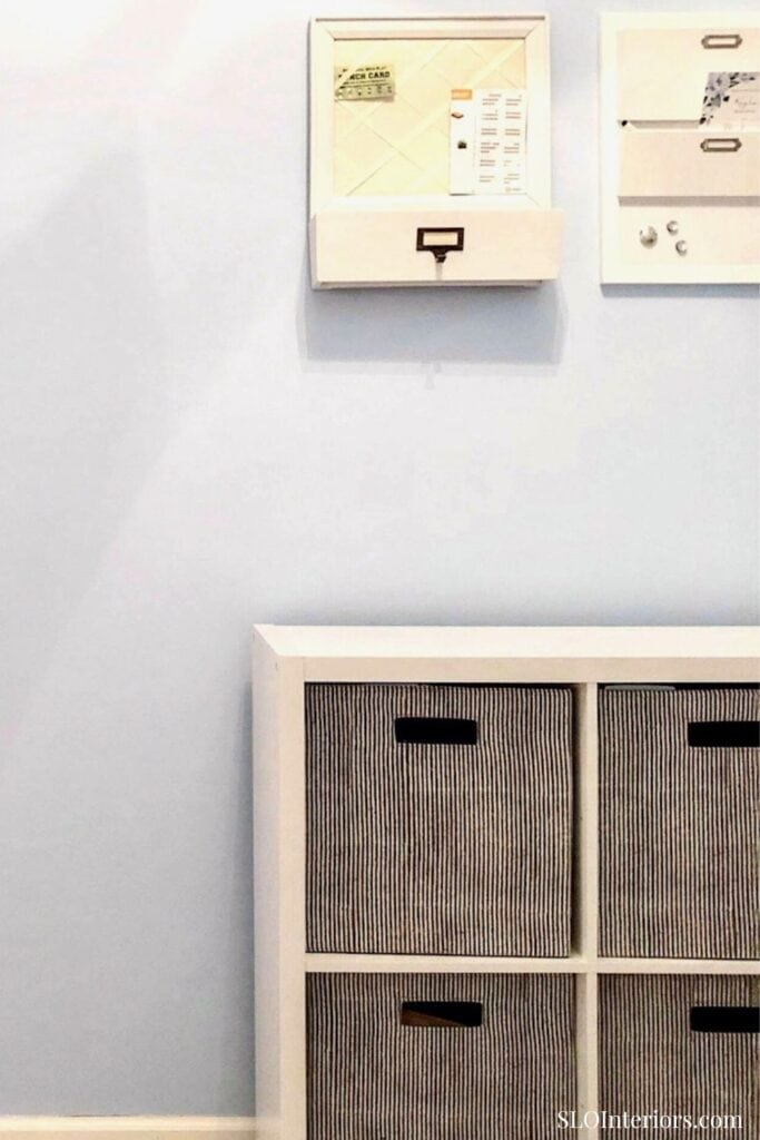 Modern mailboxes and storage cabinets in an office or reception area.