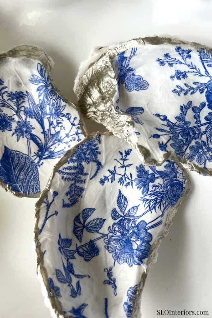 Elegant blue and white floral patterned ceramic tiles, decorative interior design element.