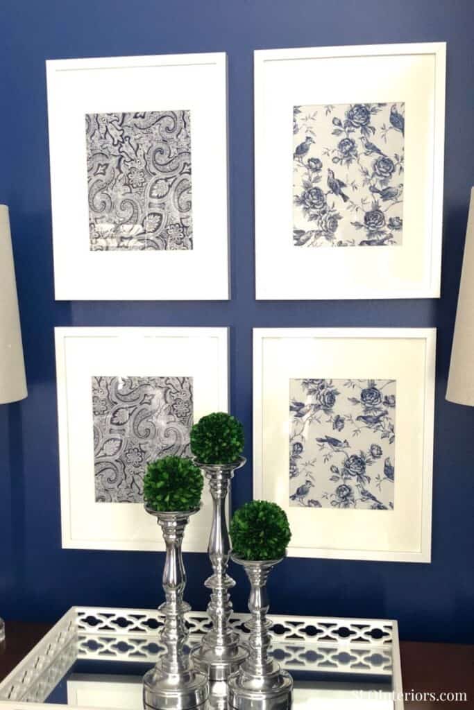 Elegant black and white floral and geometric framed artwork display at SLO Interiors.
