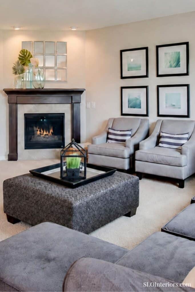 Cozy living room with fireplace, modern decor, and comfortable seating arrangement.