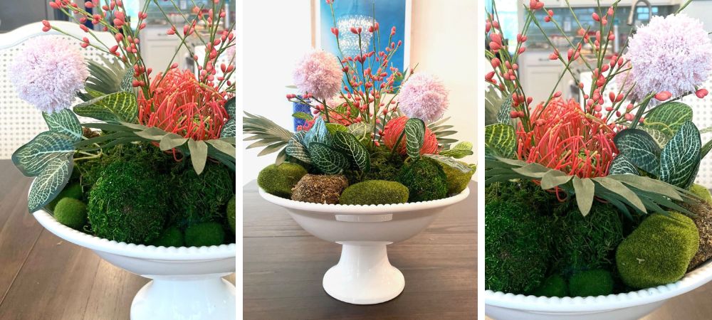 Set of three images of DIY tropical floral centerpiece on a dining table with layered greenery, moss elements, pink flowers, and coral stems.