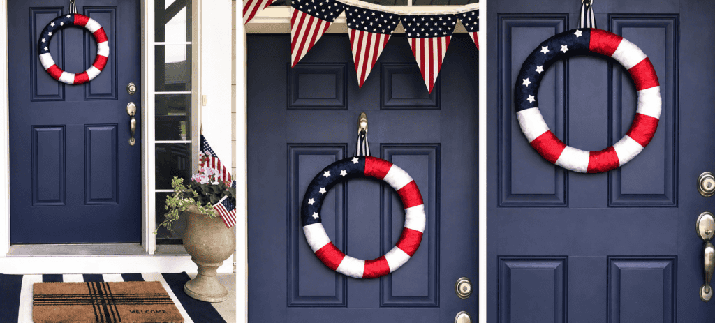 Patriotic door decor with American flag-themed wreaths and bunting.